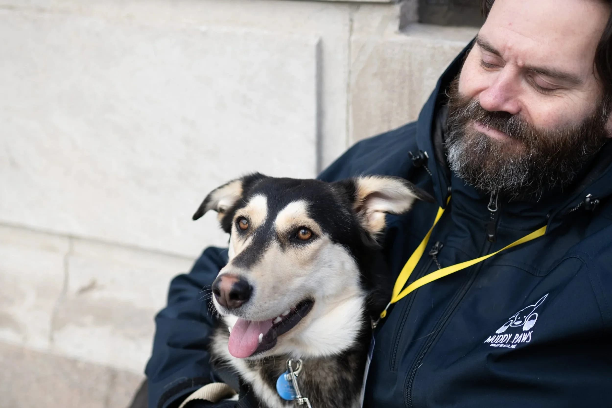 Muddy Paws volunteers with dogs